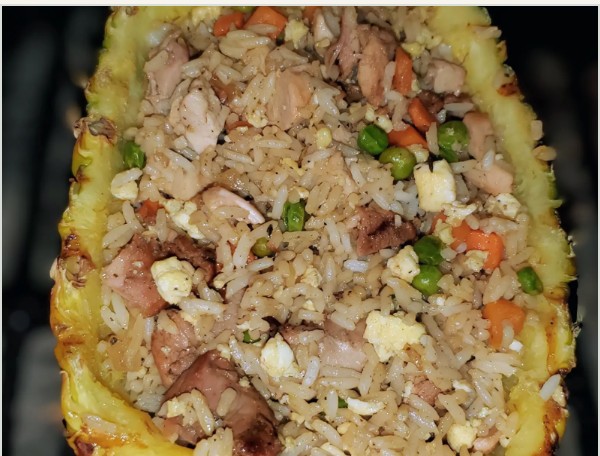 Fried rice served in a grilled pineapple boat